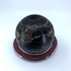 Flat round glass candle holder, 17 in. circumference, 5 1/2 in. wide.